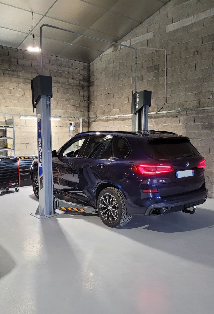 Entretien BMW X5 sur pont élévateur — Lux Motors Baziège Toulouse
